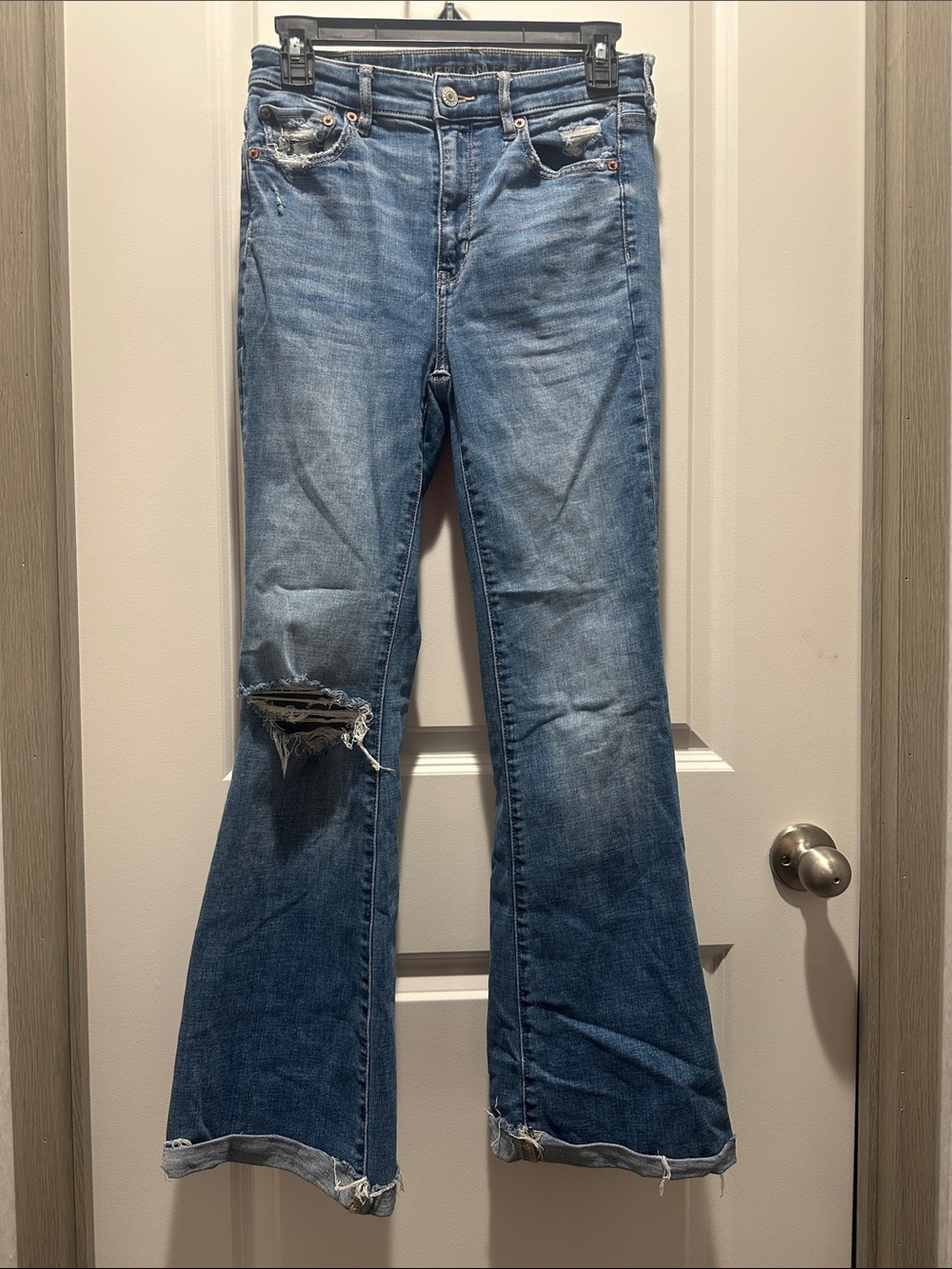 American Eagle Outfitters Medium Blue Flare Jeans with Knee Rip